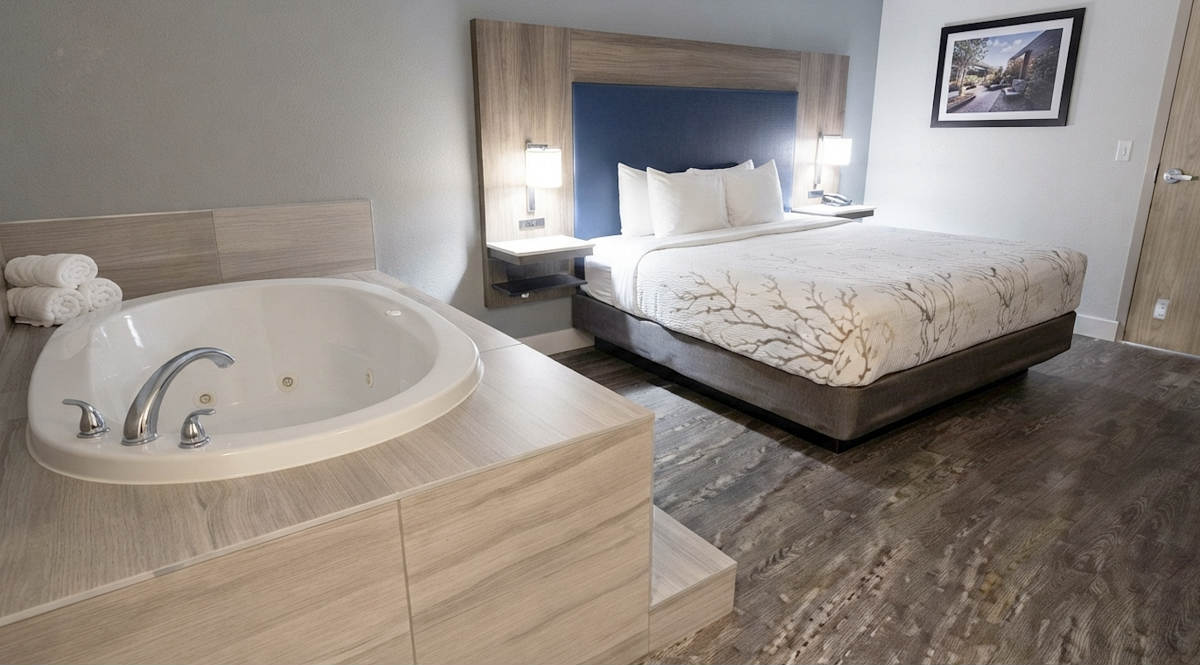 Spacious King Suite with Step-Up Whirlpool Tub at Best Western Denver East.
